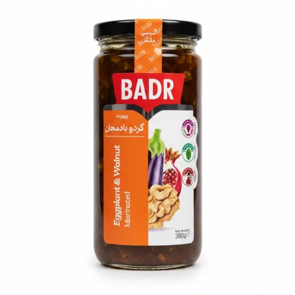 Jar of Badr brand marinated eggplant and walnut with orange and white label on a white background