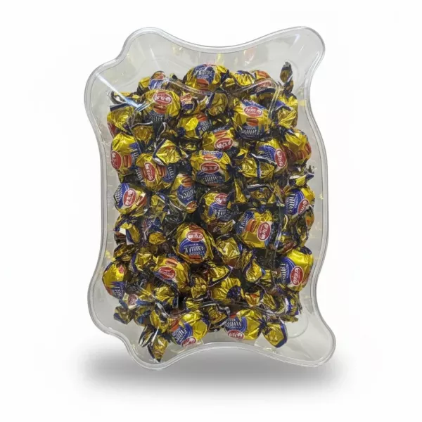 Clear container with individually wrapped Nidan Toffees filled with chocolate