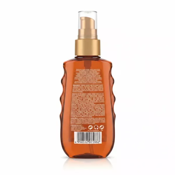Garnier Ambre Solaire Ideal Bronze tan enhancing oil bottle back with ingredients and usage