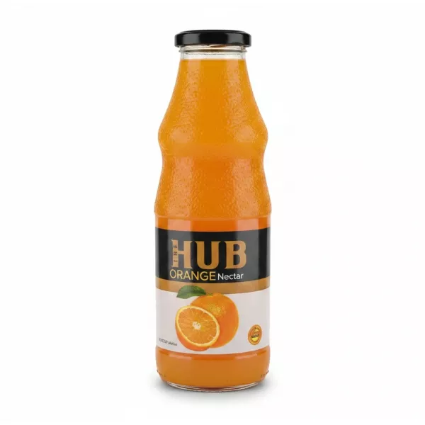Glass bottle of The Hub Orange Nectar juice on wooden desk