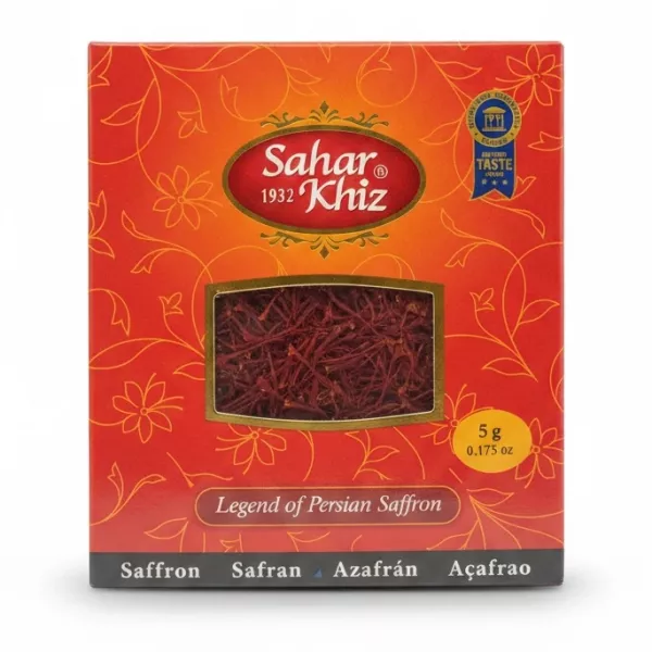 Sahar Khiz Persian saffron box front with red floral design and transparent window showing saffron threads