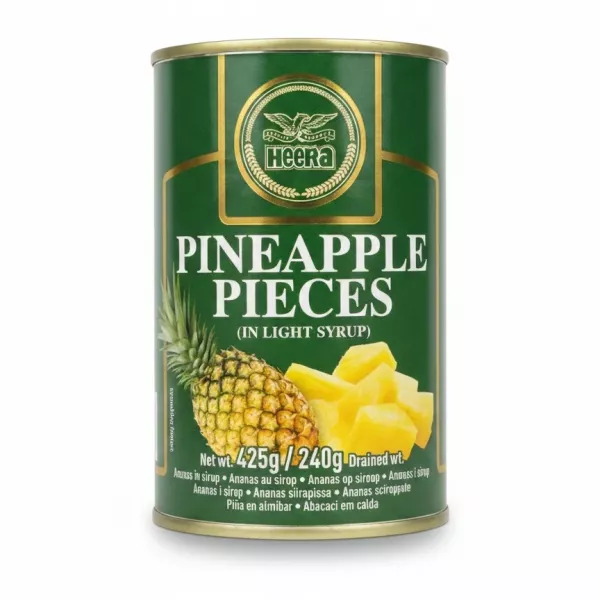 Heera brand can of pineapple pieces in light syrup showing front label