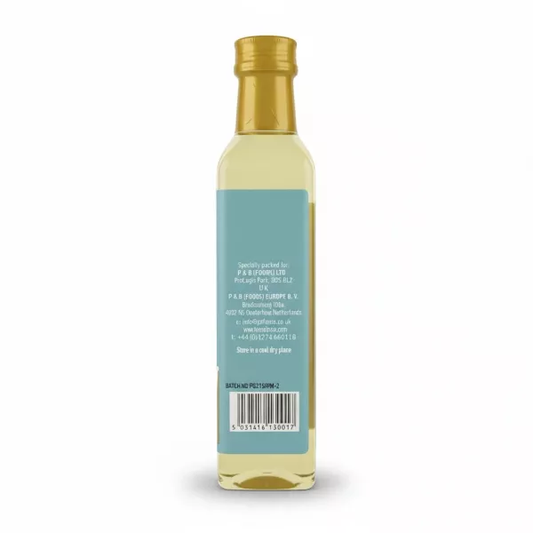 Back label of Heera Castor Oil bottle with storage and contact info