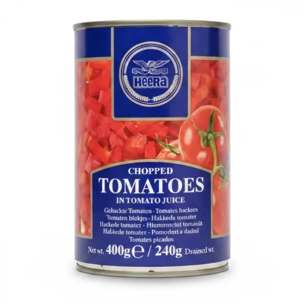 Can of Heera chopped tomatoes in tomato juice with blue label