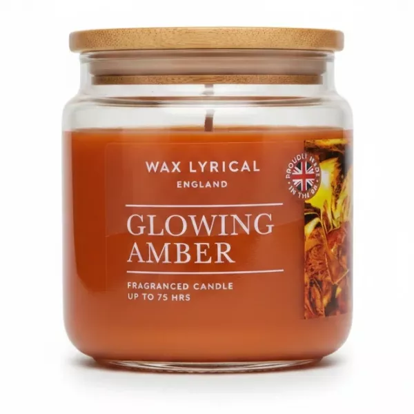 Wax Lyrical Glowing Amber candle in a transparent glass jar with bamboo lid