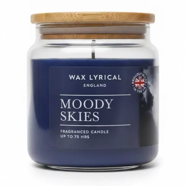 Wax Lyrical Moody Skies fragranced candle in clear glass jar with bamboo lid showing front label