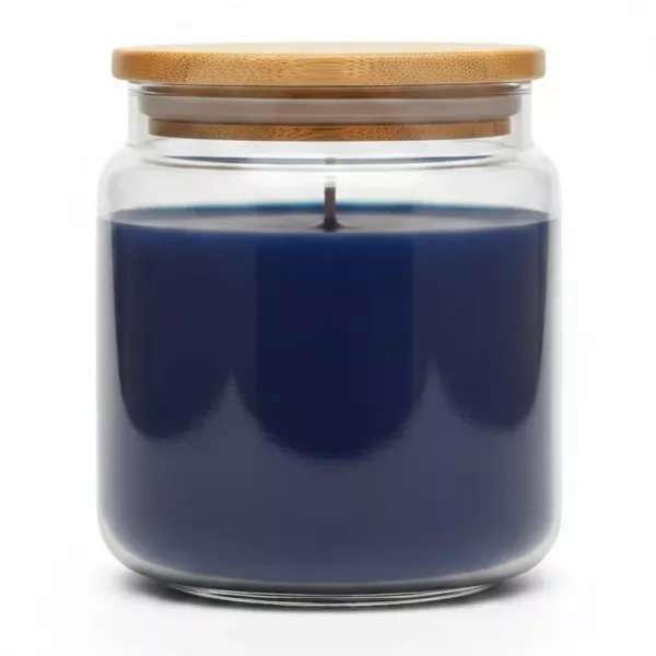 Wax Lyrical Moody Skies fragranced candle with visible blue wax inside clear glass jar