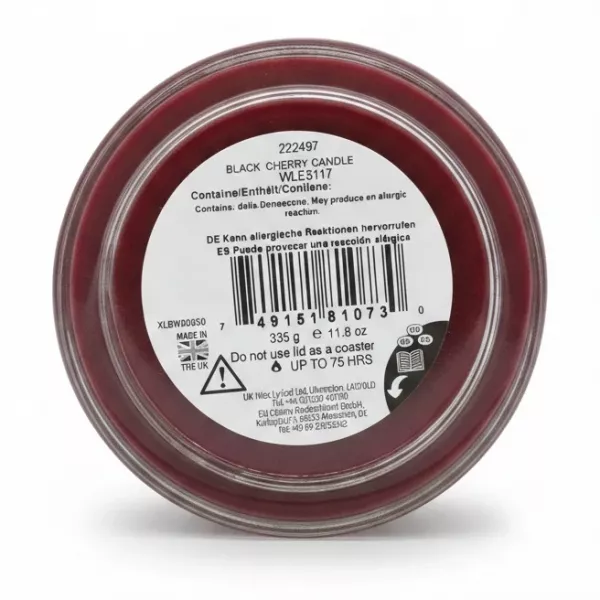 Bottom view of candle showing barcode and product details