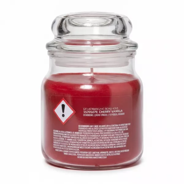 Back of Yankee Candle jar with hazard warning and ingredient text