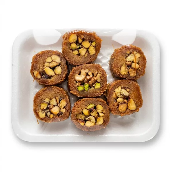 Enhanced Tray of Rayan assorted baklava rolls with visible nut filling