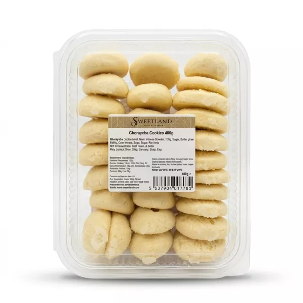 A professional e-commerce photo of a clear plastic container filled with Sweetland Ghorayeba Cookies Classic, 400g. The container is centered against a clean white background, showing the stacked, pale yellow cookies. The main product label is visible and clear, while all other tags and stickers have been removed. PRODUCT TITLE: Sweetland Ghorayeba Cookies Classic PRODUCT: Sweetland Ghorayeba Cookies 400g clear pack with label