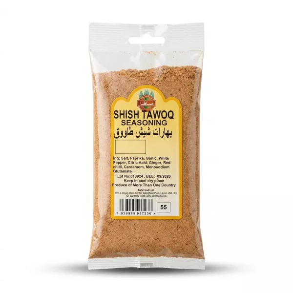 Enhanced A 100g packet of Safa Shish Tawoq Seasoning held in hand in a grocery store