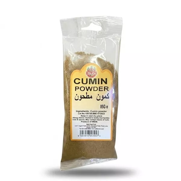 Enhanced Enhanced Hand holding a packet of Safa Cumin Powder 85g