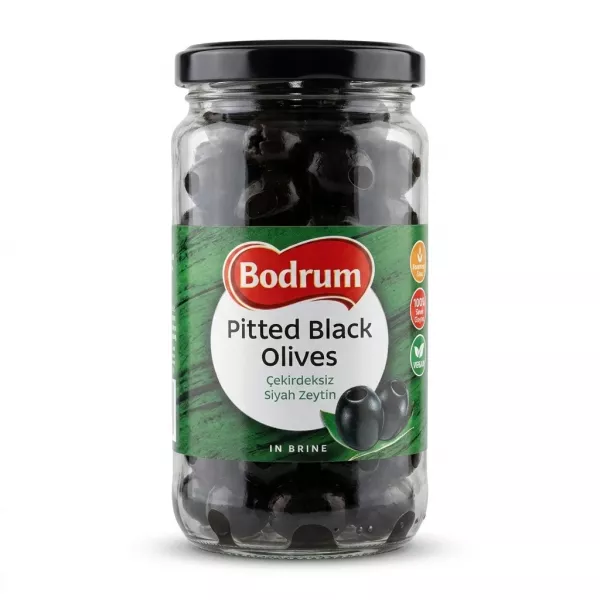 Enhanced Front view of Bodrum Pitted Black Olives jar held in hand in a store aisle