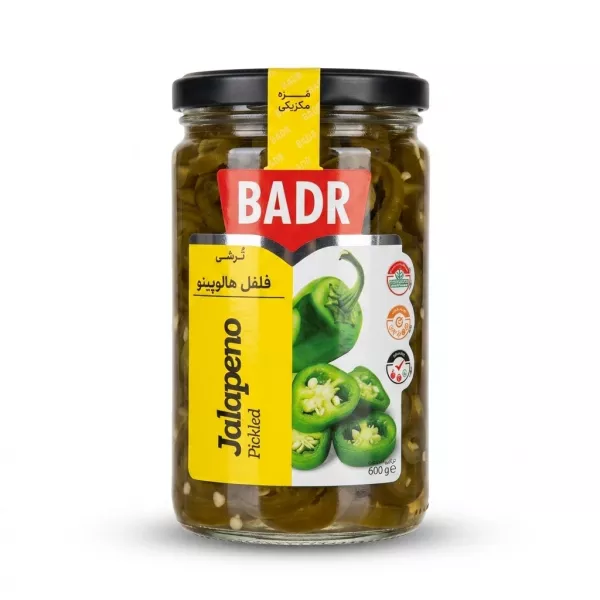 Enhanced Front label of Badr Pickled Jalapeno 600g jar held in hand