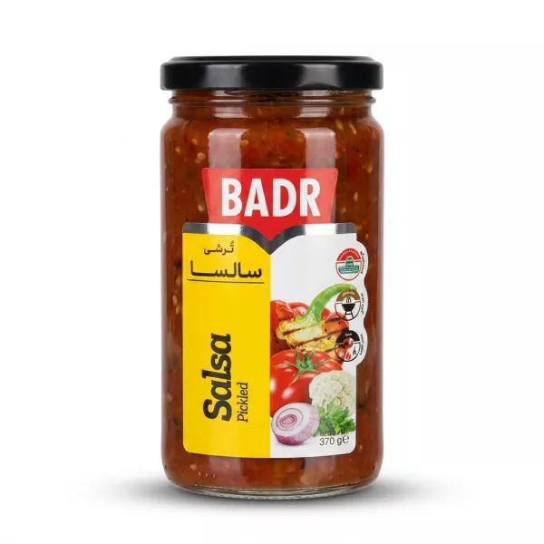 Enhanced Front view of Badr Pickled Salsa 370g jar held in hand with vegetables illustration