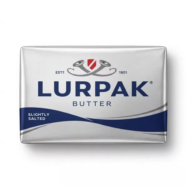 Enhanced Lurpak Slightly Salted Butter 200g held in hand front view