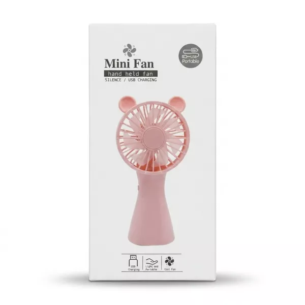 Enhanced Box of Mini Fan hand held fan in pink with USB charging icons on a countertop