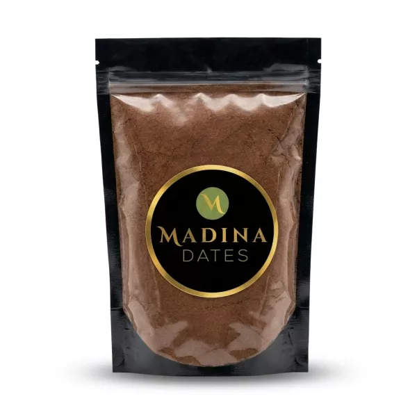 Enhanced A resealable pouch of Madina Dates date powder held in hand