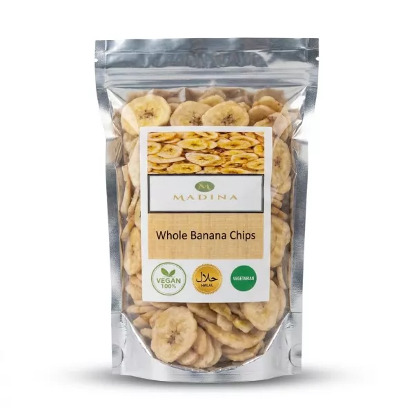 Enhanced A hand holding a packet of Madina Whole Banana Chips with vegan, halal, and vegetarian labels clearly displayed.