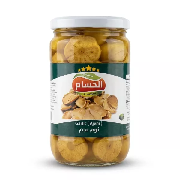 Enhanced Front of Al Hussam Garlic Ajem Pickle jar showing label and garlic slices