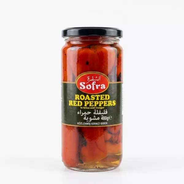 Enhanced Front of Sofra Roasted Red Peppers jar held in hand in supermarket aisle