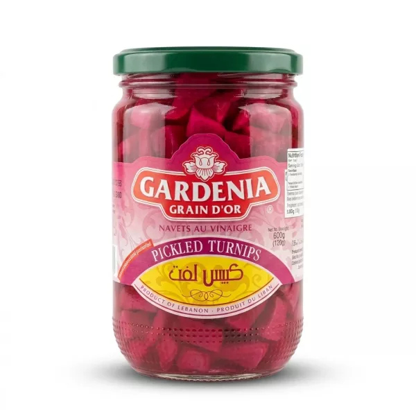 A professional e-commerce photo showing a glass jar of Gardenia Grain D'Or Pickled Turnips on a clean white background. The jar has a green lid and is filled with vibrant pink picked turnips, with a detailed label in English, French, and Arabic.