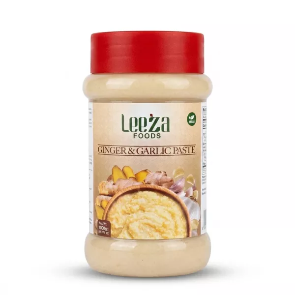 A 1000g jar of Leeza Foods Ginger & Garlic Paste with a red lid, featuring a detailed label showing the paste and fresh ingredients, isolated against a plain white background with professional lighting.