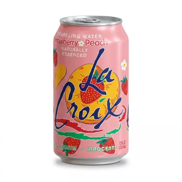 Enhanced Hand holding La Croix Strawberry Peach Sparkling Water can in a shop