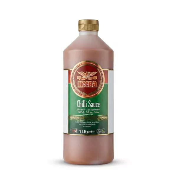 Enhanced Heera Chilli Sauce 1 litre bottle held in grocery aisle