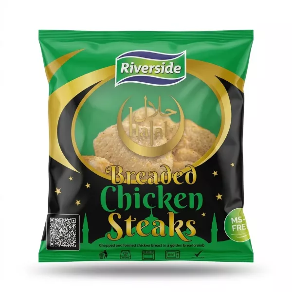 A professional studio photograph of a bag of Riverside Halal Breaded Chicken Steaks. The green and black packaging features a golden Halal certification crescent, a clear window to the breaded chicken steaks, and golden and green text, presented centrally against a clean white background.