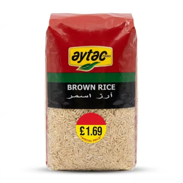 A 1kg pack of Aytac Foods Brown Rice, featuring its red, green, and black packaging with a special price sticker, centered in sharp focus on a clean white background.