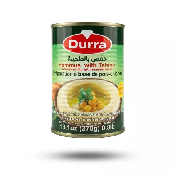 Enhanced Enhanced Front of Durra Hommus with Tahini 370g tin held in hand