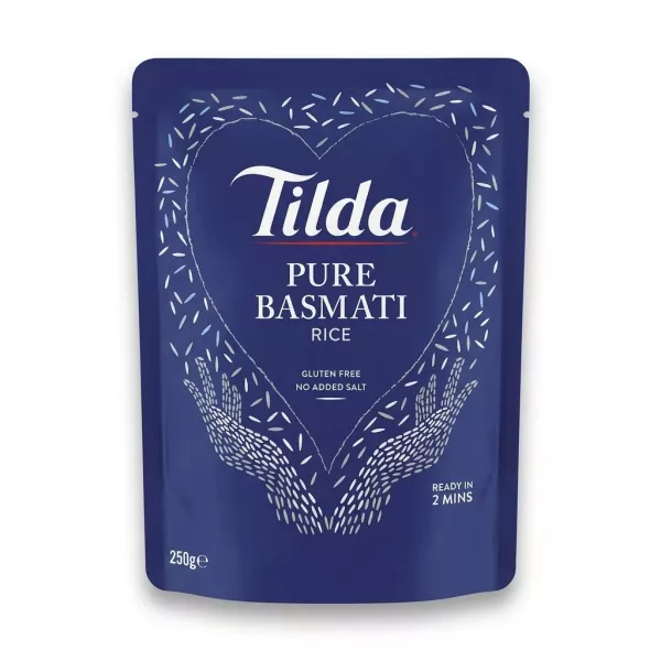 A 250g blue stand-up pouch of Tilda Pure Basmati Rice Classics is centered against a clean white background. The pouch shows product details and branding, and has soft, symmetrical shadows on both sides.