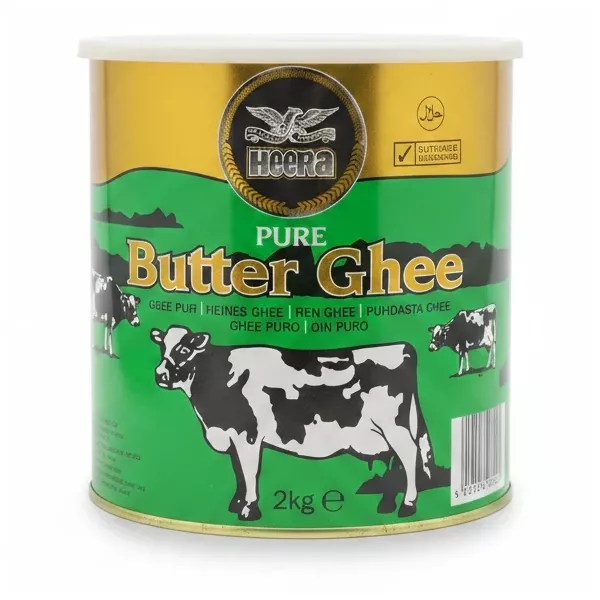 Heera Pure Butter Ghee 2kg tin container with green and gold design and cow illustrations