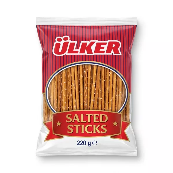A 220g pack of Ülker Salted Sticks snack is shown in a professional, front-facing e-commerce photo with clean, even lighting and a soft shadow on both sides. The red and blue packaging features the distinct Ülker logo and a clear window displaying the salted pretzel sticks inside.