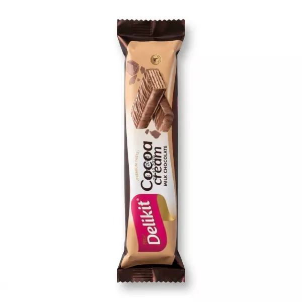 Enhanced Delikit Cocoa Cream Milk Chocolate Bar in hand showing front packaging