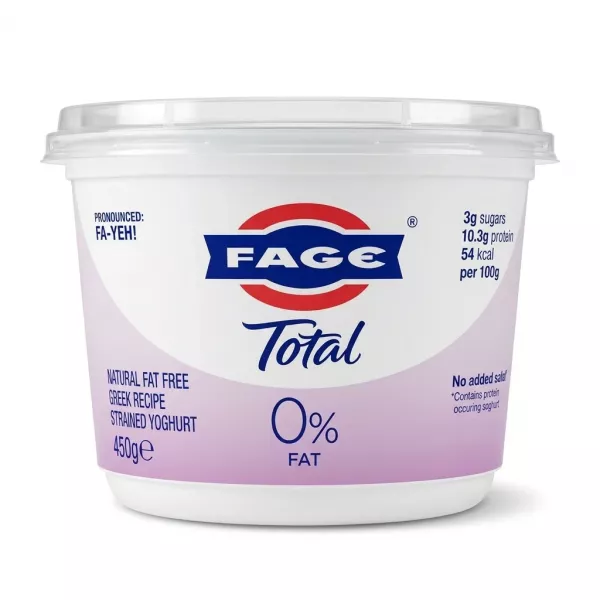 A professional e-commerce product photo showing the front of a FAGE Total 0% Fat Greek Yoghurt 450g plastic tub against a pure white background. The clean, white tub is centered and fills most of the frame, clearly displaying the FAGE brand logo, the large "Total" script, and "0% FAT" below it on a light purple band. All product information, including nutritional data and "Natural Fat Free Greek Recipe Strained Yoghurt", is sharp and legible under bright studio lighting with soft, even shadowing.