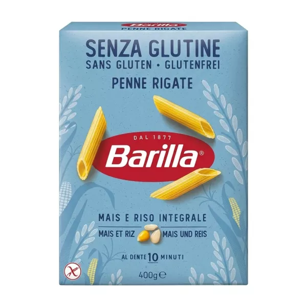 A 400g box of Barilla Gluten Free Penne Rigate pasta made with corn and brown rice, presented in a clean studio setting.