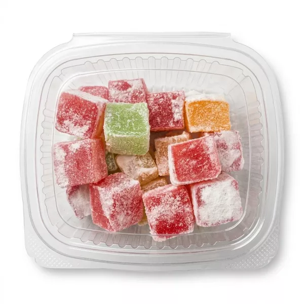 Plastic container filled with assorted colourful Turkish Delight cubes dusted with powdered sugar and an orange £3.99 price sticker