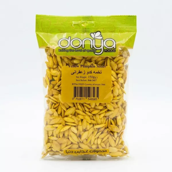 Front view of Donya Yellow Pumpkin Seeds 150g pack held in hand, showing branding and product details