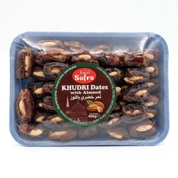 Pack of Sofra Khudri Dates with Almond, 400g, held in a shop aisle