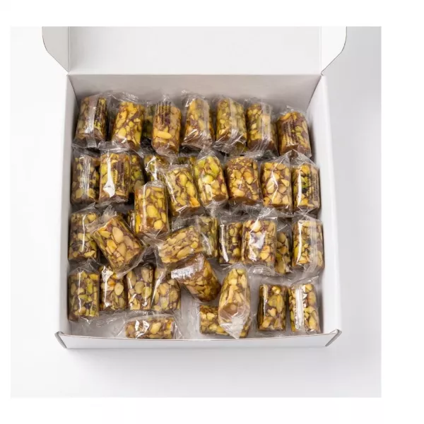 Individually wrapped Liban Vert Malban Araysseh Extra pistachio sweets in a box