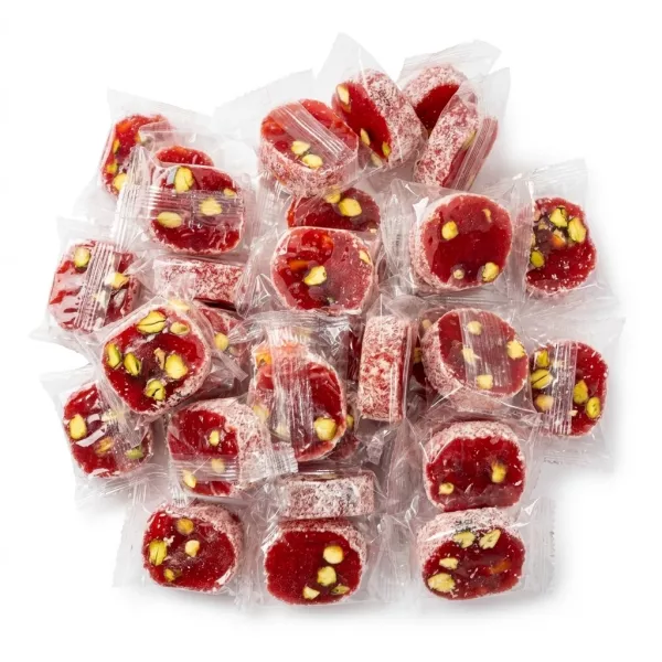 Individually wrapped red Malban pomegranate rolls with pistachios and coconut flakes