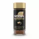 Glass jar of Nescafe Espresso Rich Crema instant coffee with gold lid