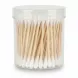 Clear container with cotton buds and wooden sticks inside