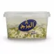 Side view of Alburj Pistachio Halva tub highlighting packaging design and pistachio pieces