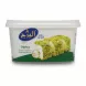 Alburj Halva Extra Pistachio tub showing pistachio-coated halva slices