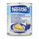 Nestlé brand sweetened condensed milk can front label with pie and coffee image