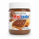 Jar of Melinda Hazelnut Praline with Cocoa spread in hand
